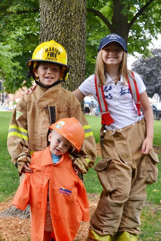 kids dressed as city employees