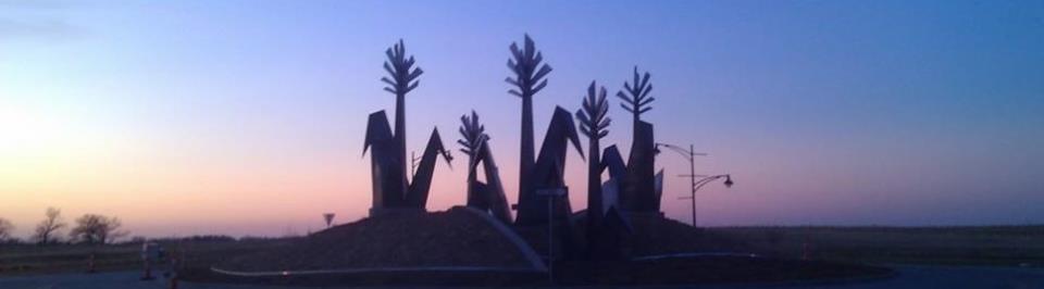 roundabout sculpture at sunset