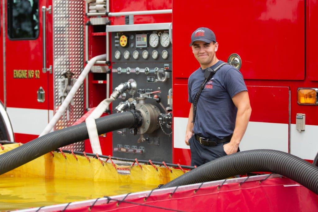 firefighter by engine