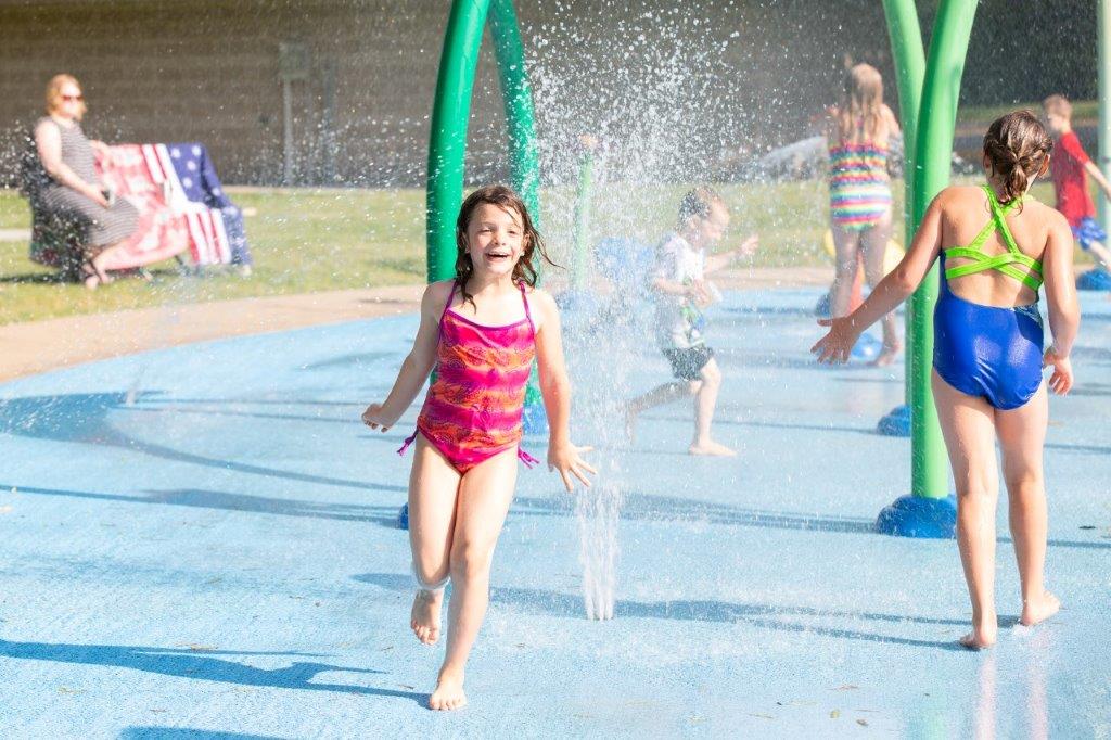 kids playing at splash pad