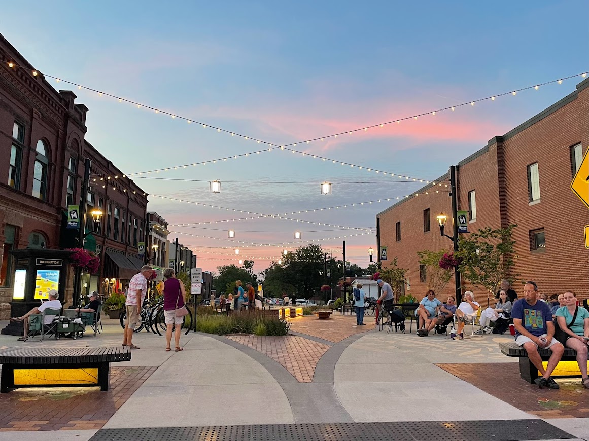 plaza at dusk with people